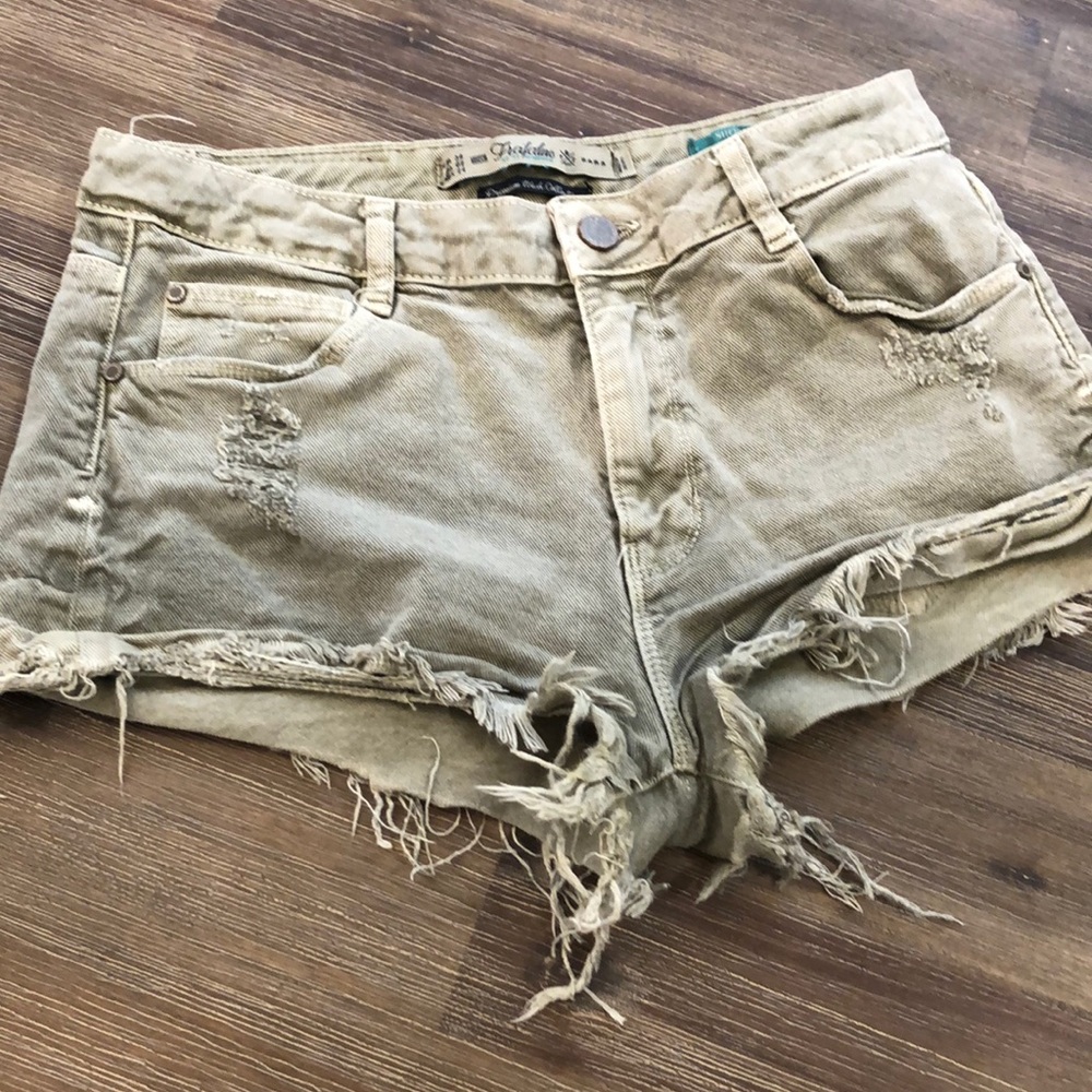 Green denim high rise shorts
